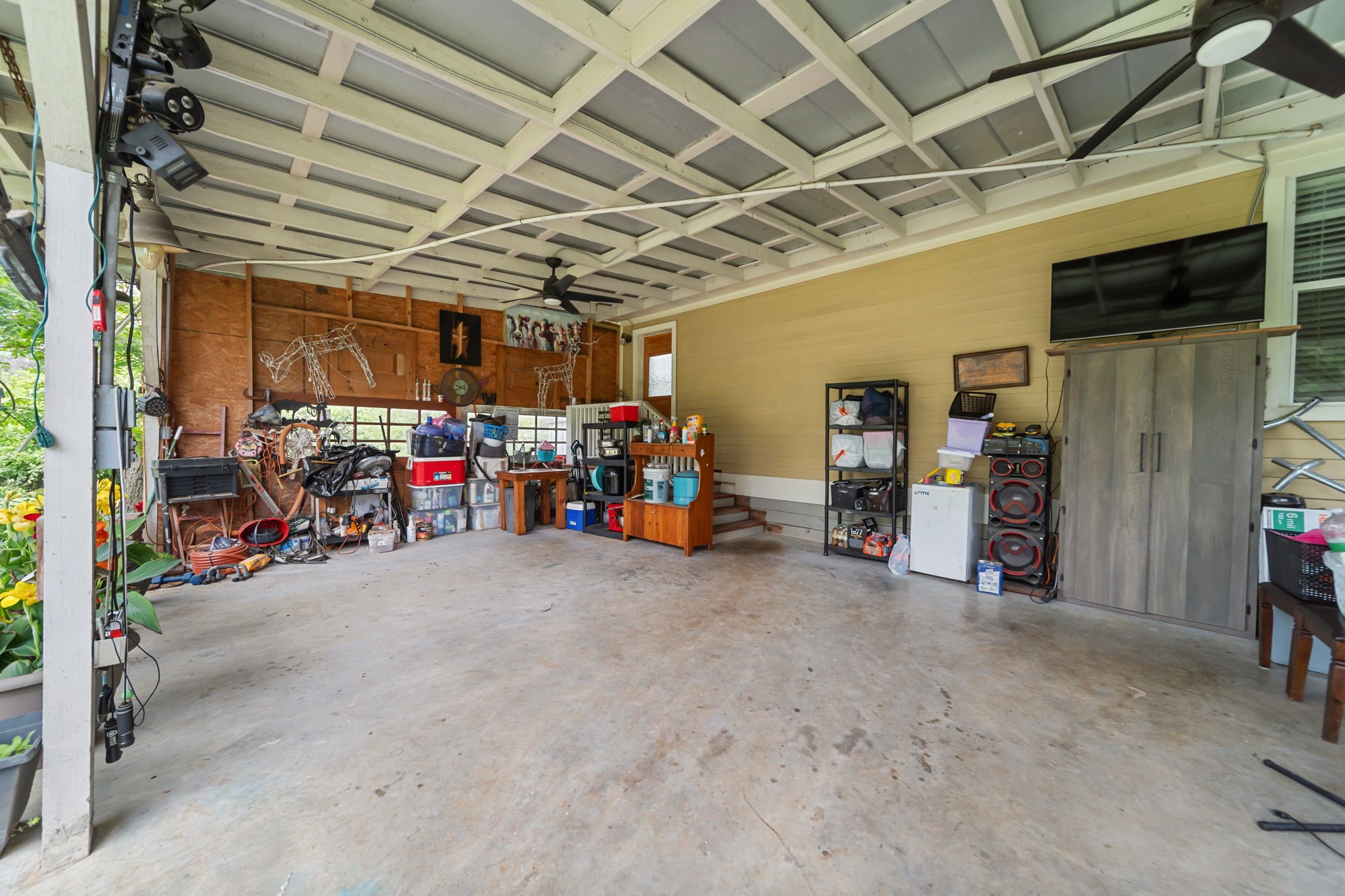 202 Sweed Street Brenham, TX 77833 - Photo 22 of 34 a view of a garage with storage