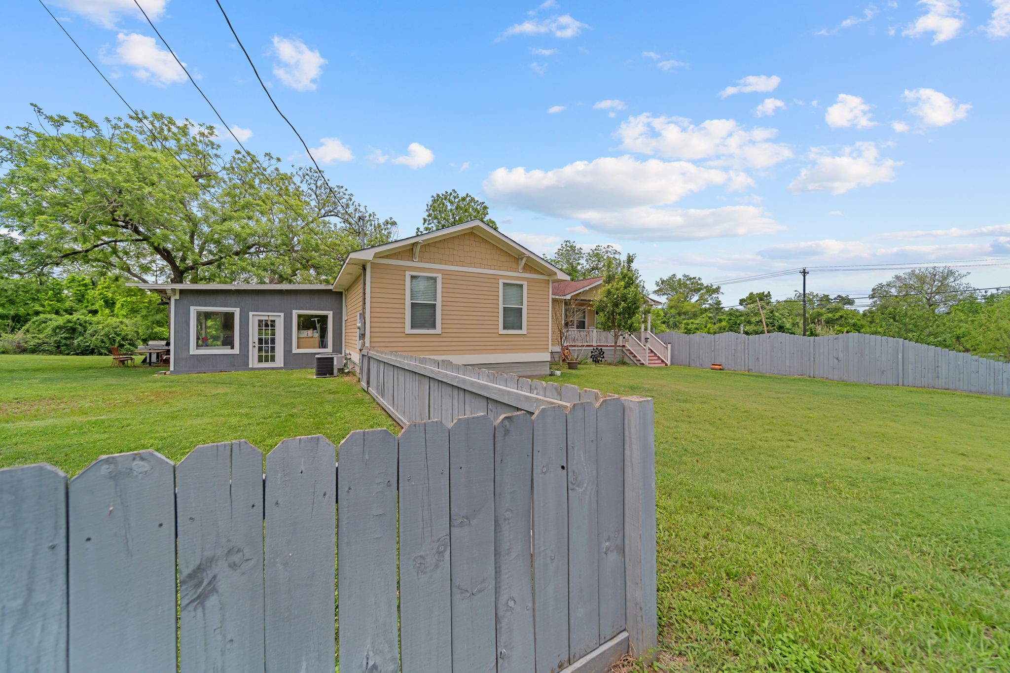 202 Sweed Street Brenham, TX 77833 - Photo 23 of 34 a view of an house with backyard space and garden