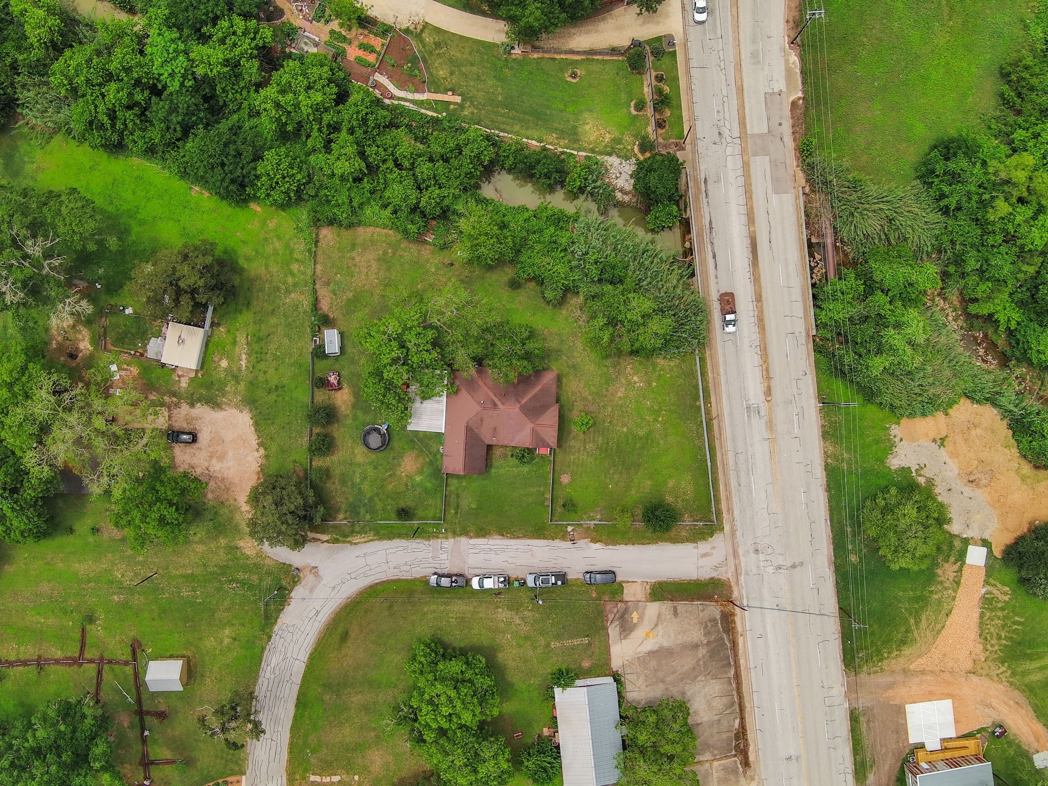 202 Sweed Street Brenham, TX 77833 - Photo 30 of 34 an aerial view of a residential houses with outdoor space and street view