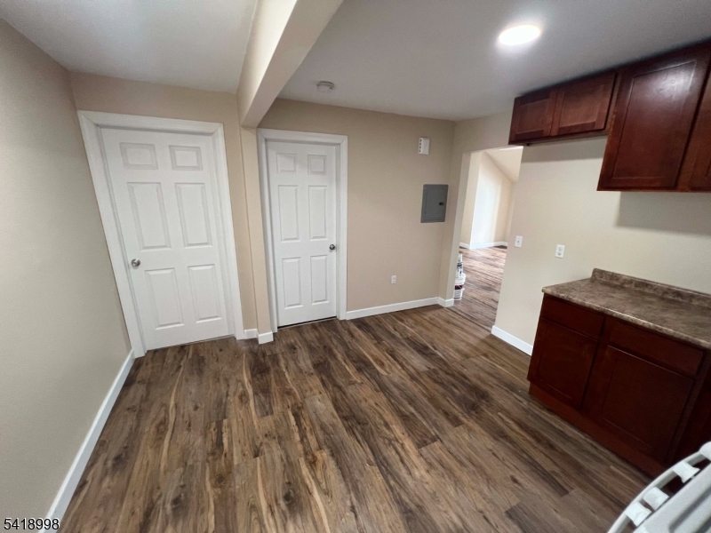 562 Summer Street Paterson, NJ 07501 - Photo 8 of 9 a view of kitchen and wooden floor