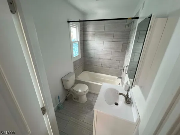 a bathroom with a sink and a tub