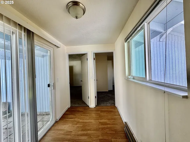 a view of a hallway with closet area