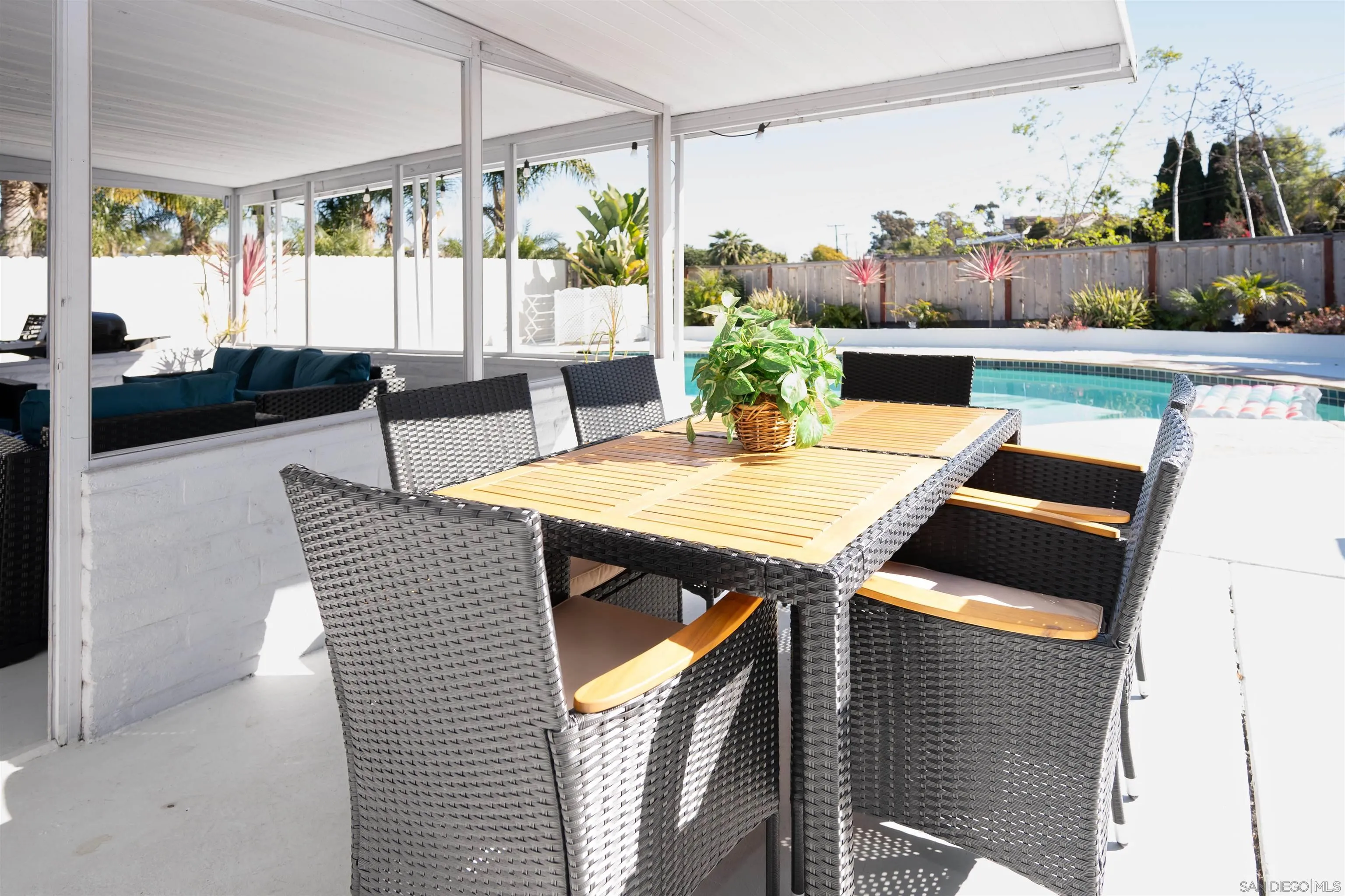 Undisclosed Address Oceanside, CA 92054 - Photo 18 of 19 a outdoor dining space with furniture and a potted plant