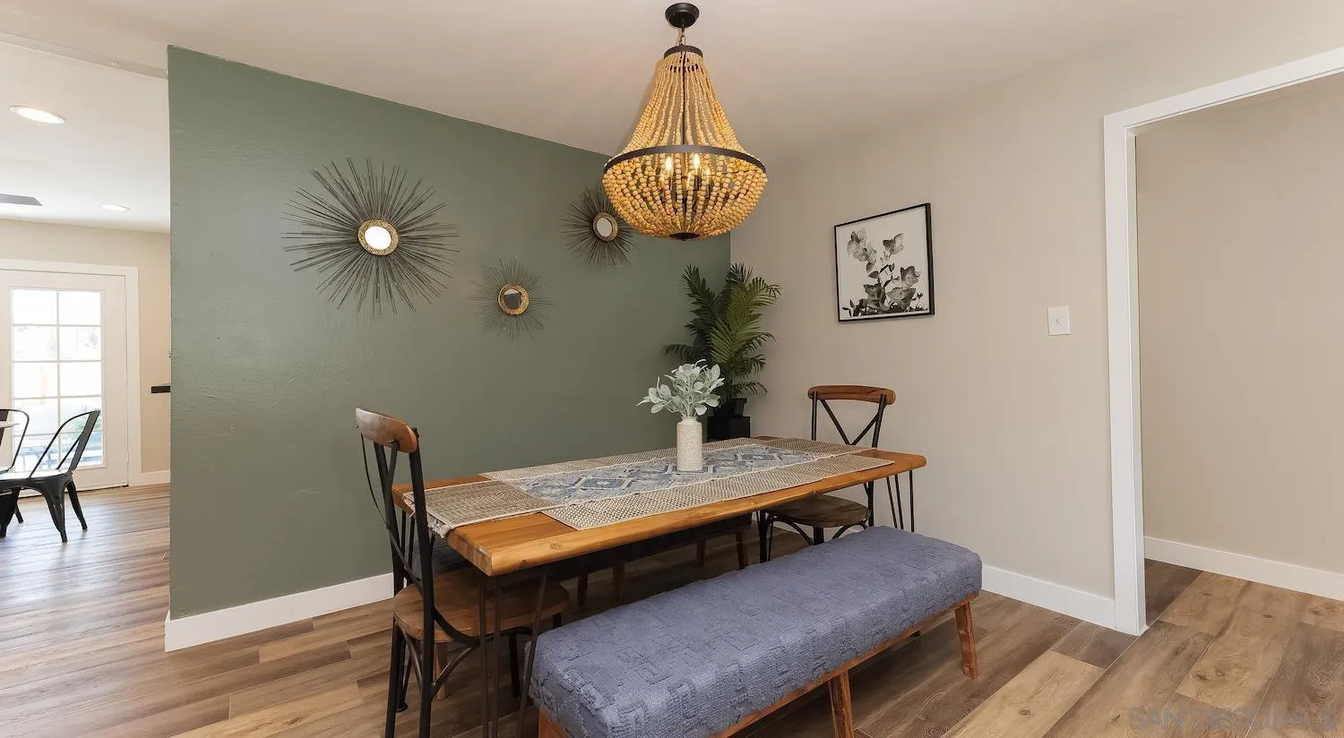 Undisclosed Address Oceanside, CA 92054 - Photo 10 of 19 a dining room with furniture and wooden floor