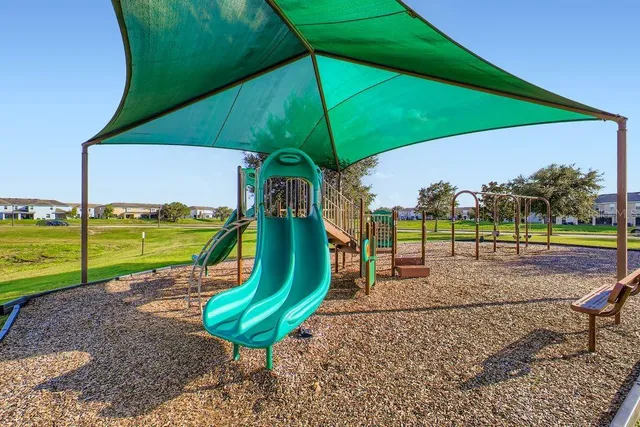 a view of a park with slide