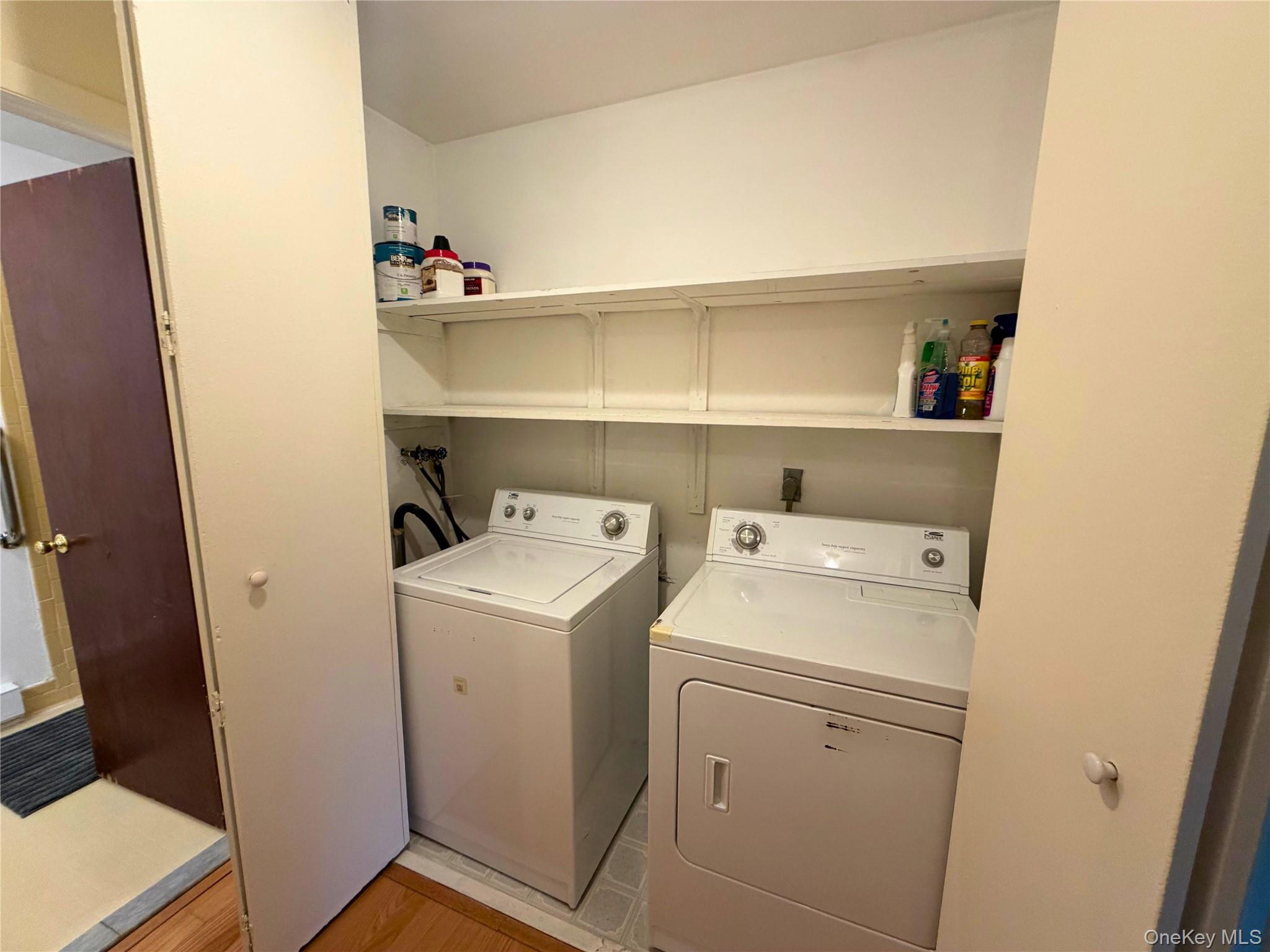 11 Patterson Village Court Patterson, NY 12563 - Photo 5 of 12 a utility room with dryer and washer