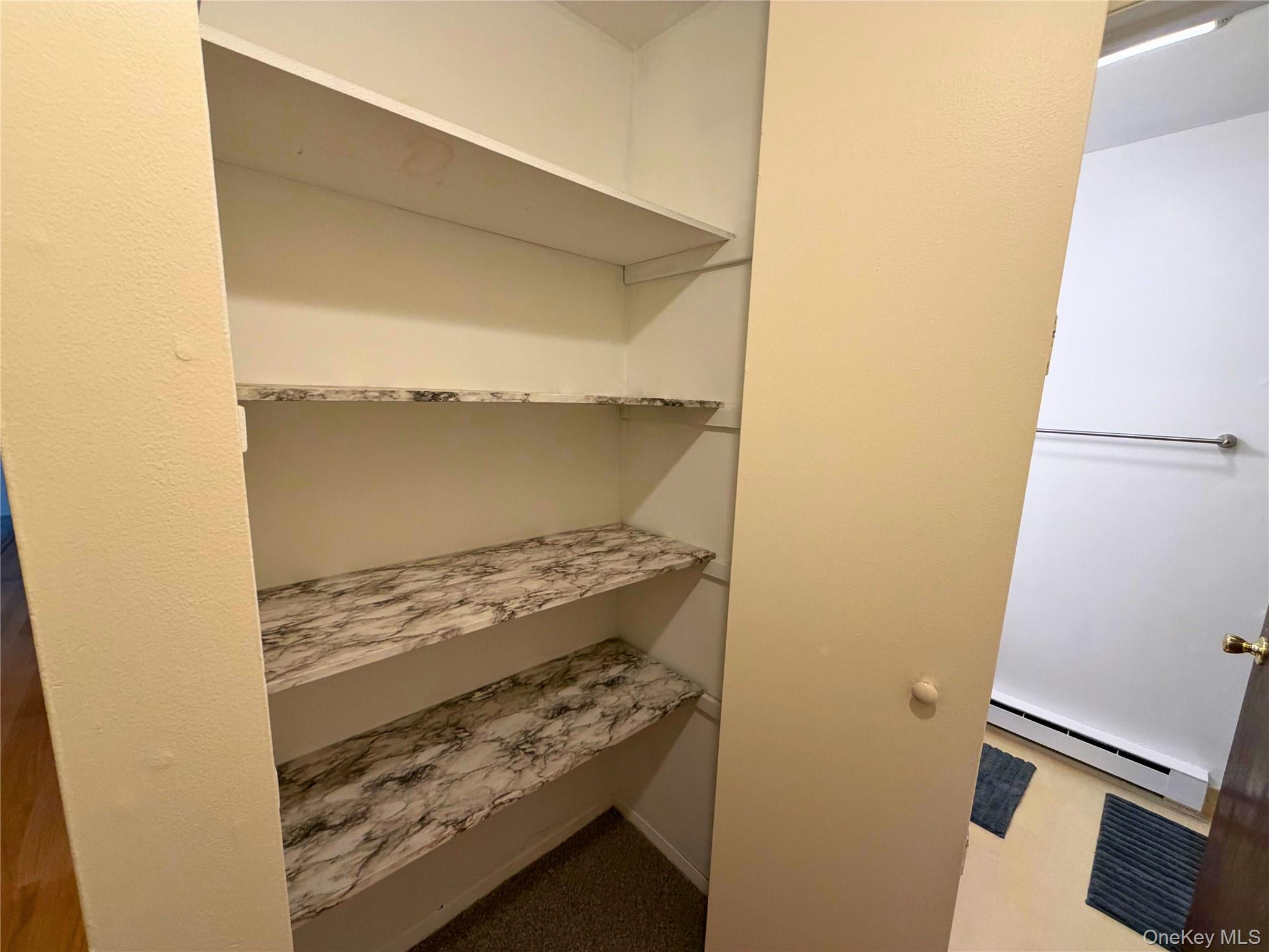 11 Patterson Village Court Patterson, NY 12563 - Photo 10 of 12 a view of washer and dryer