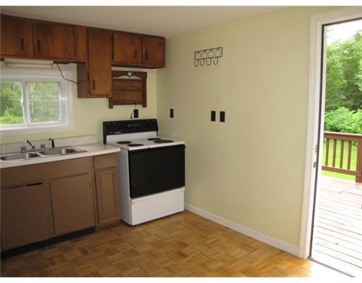 178 Augusta Road Whitefield, ME 04353 - Photo 3 of 13 Kitchen. Kitchen w/ wood floor open...