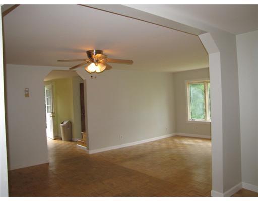 178 Augusta Road Whitefield, ME 04353 - Photo 4 of 13 Living Room. Spacious LR w/ wood...