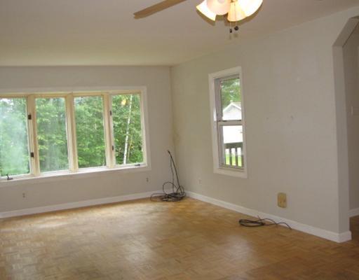 178 Augusta Road Whitefield, ME 04353 - Photo 5 of 13 Living Room. LR view with southwest...
