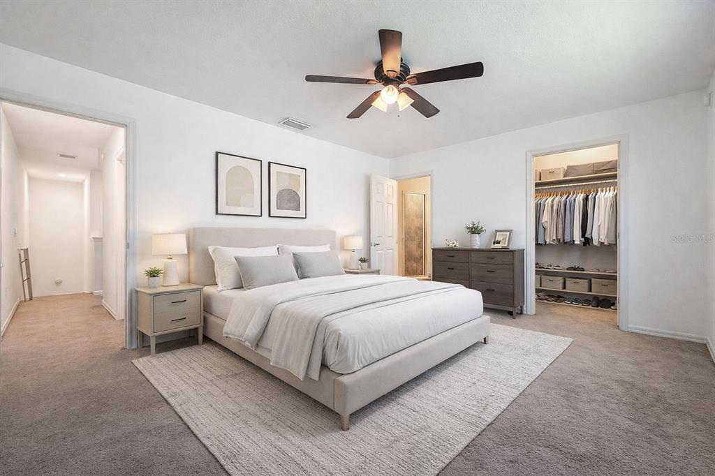 5101 Chipotle Lane Wesley Chapel, FL 33544 - Photo 17 of 25 a bedroom with a bed and closet