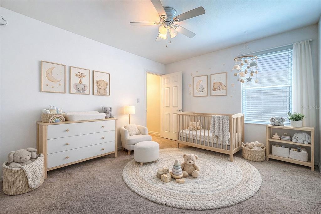 5101 Chipotle Lane Wesley Chapel, FL 33544 - Photo 19 of 25 a bed room with furniture and a window
