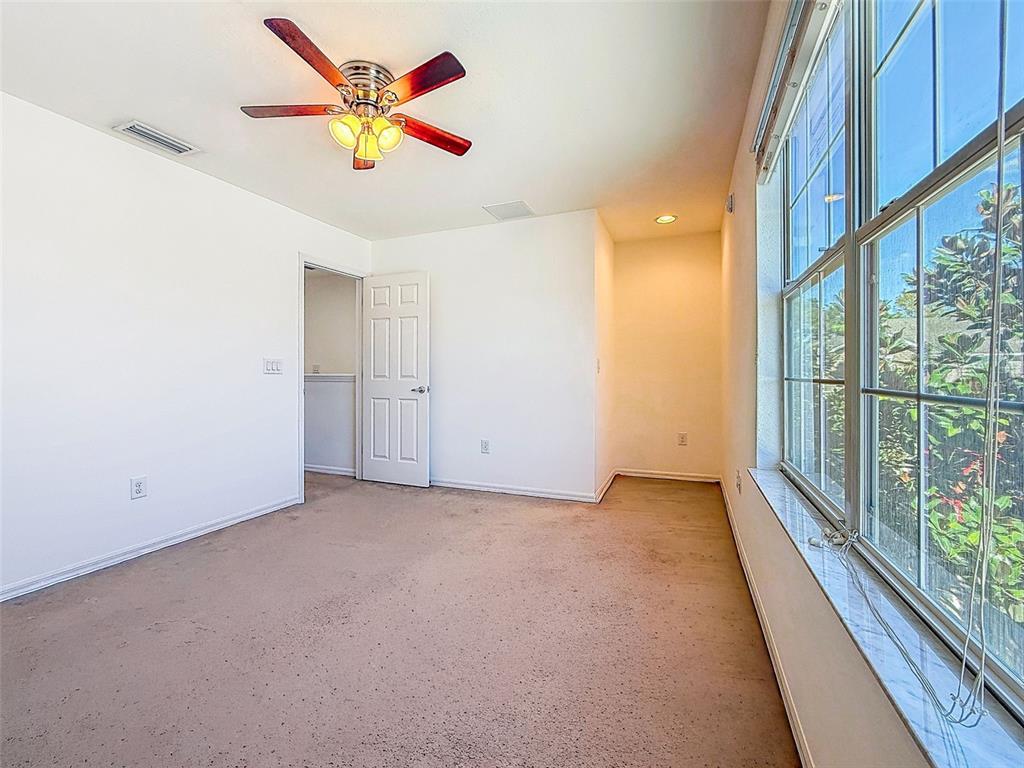 5101 Chipotle Lane Wesley Chapel, FL 33544 - Photo 20 of 25 a view of an empty room with a window
