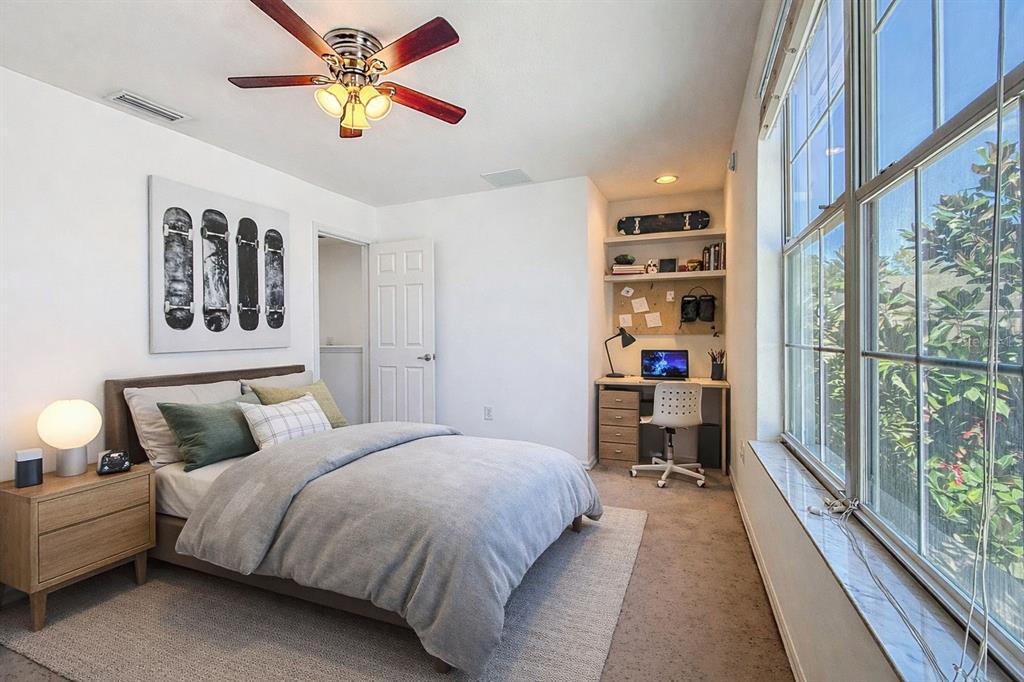 5101 Chipotle Lane Wesley Chapel, FL 33544 - Photo 21 of 25 a bedroom with a bed and a chandelier