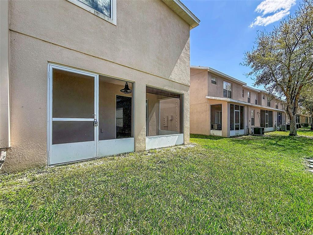 5101 Chipotle Lane Wesley Chapel, FL 33544 - Photo 23 of 25 front view of a house with a yard