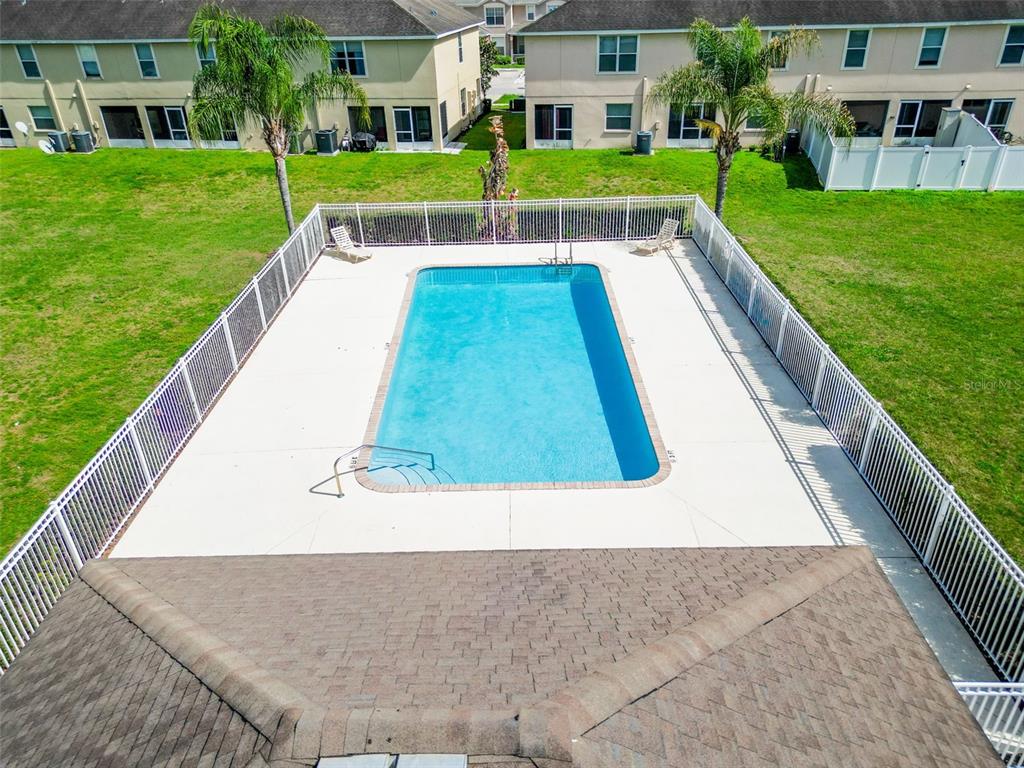5101 Chipotle Lane Wesley Chapel, FL 33544 - Photo 5 of 25 a view of yard with swimming pool and green space