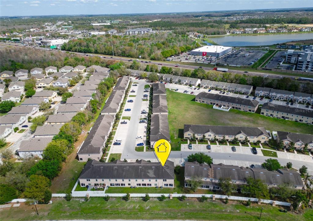 5101 Chipotle Lane Wesley Chapel, FL 33544 - Photo 6 of 25 an aerial view of a city with a lake