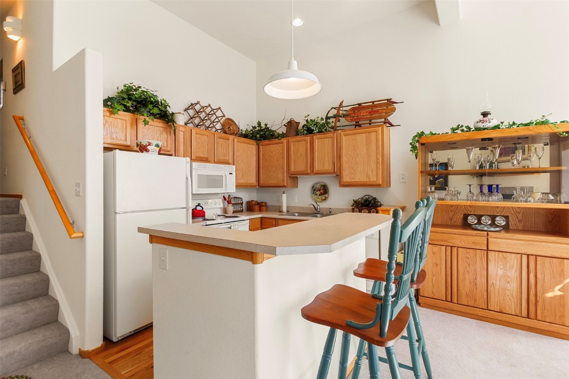 91299 Ryan Gulch Road, Unit A4 Wildernest, CO 80498 - Photo 8 of 30 a view of kitchen and living room with furniture