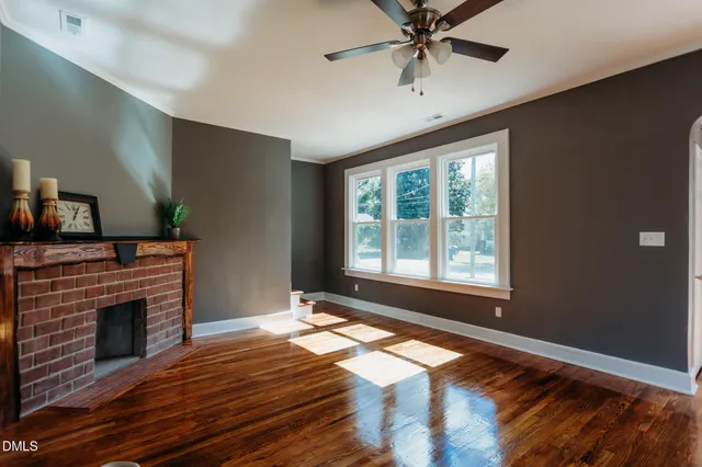 a kitchen with granite countertop cabinets stainless steel appliances and a sink