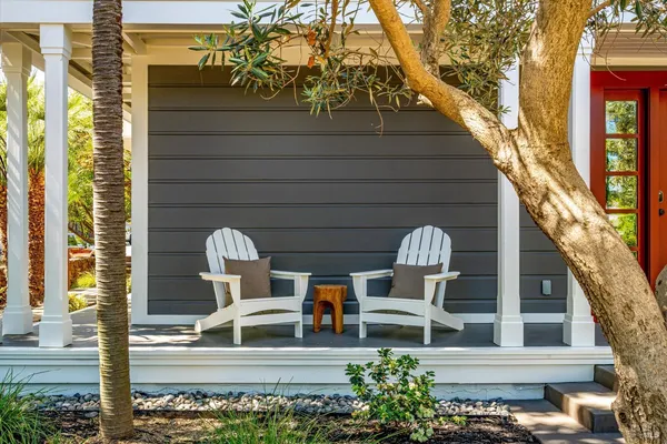 a view of a balcony with wooden floor