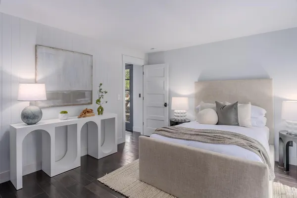 a view of a livingroom with furniture and windows