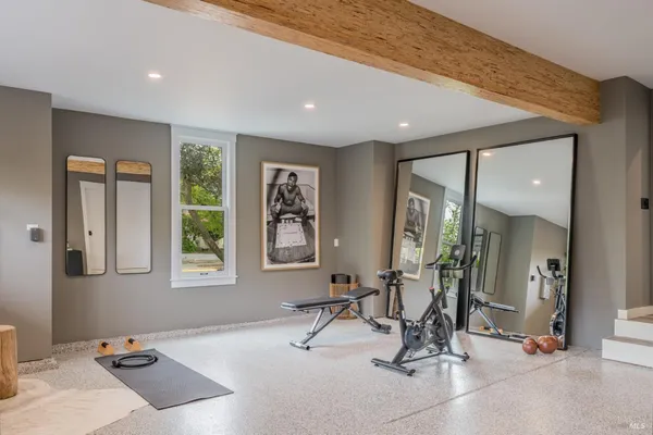 a view of a room with gym equipment