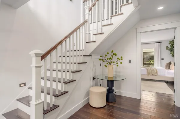 a view of a livingroom with furniture and windows