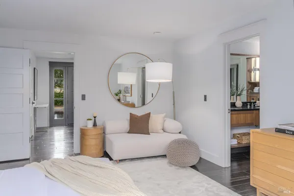 a view of a patio with couches and a table and chairs