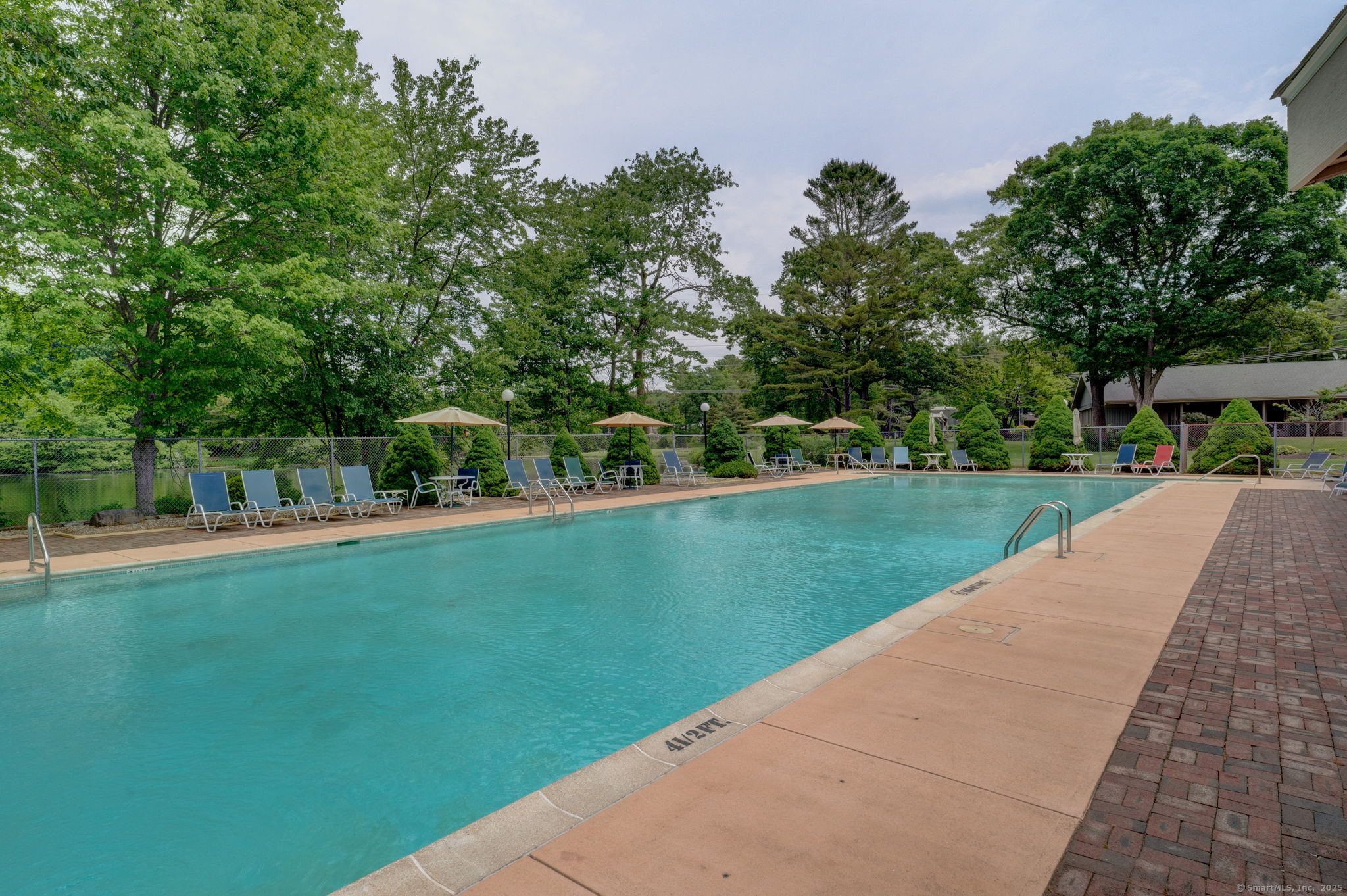 10 Deepwood Drive, Unit 10 Southington, CT 06489 - Photo 23 of 31 a view of a park with trees and plants
