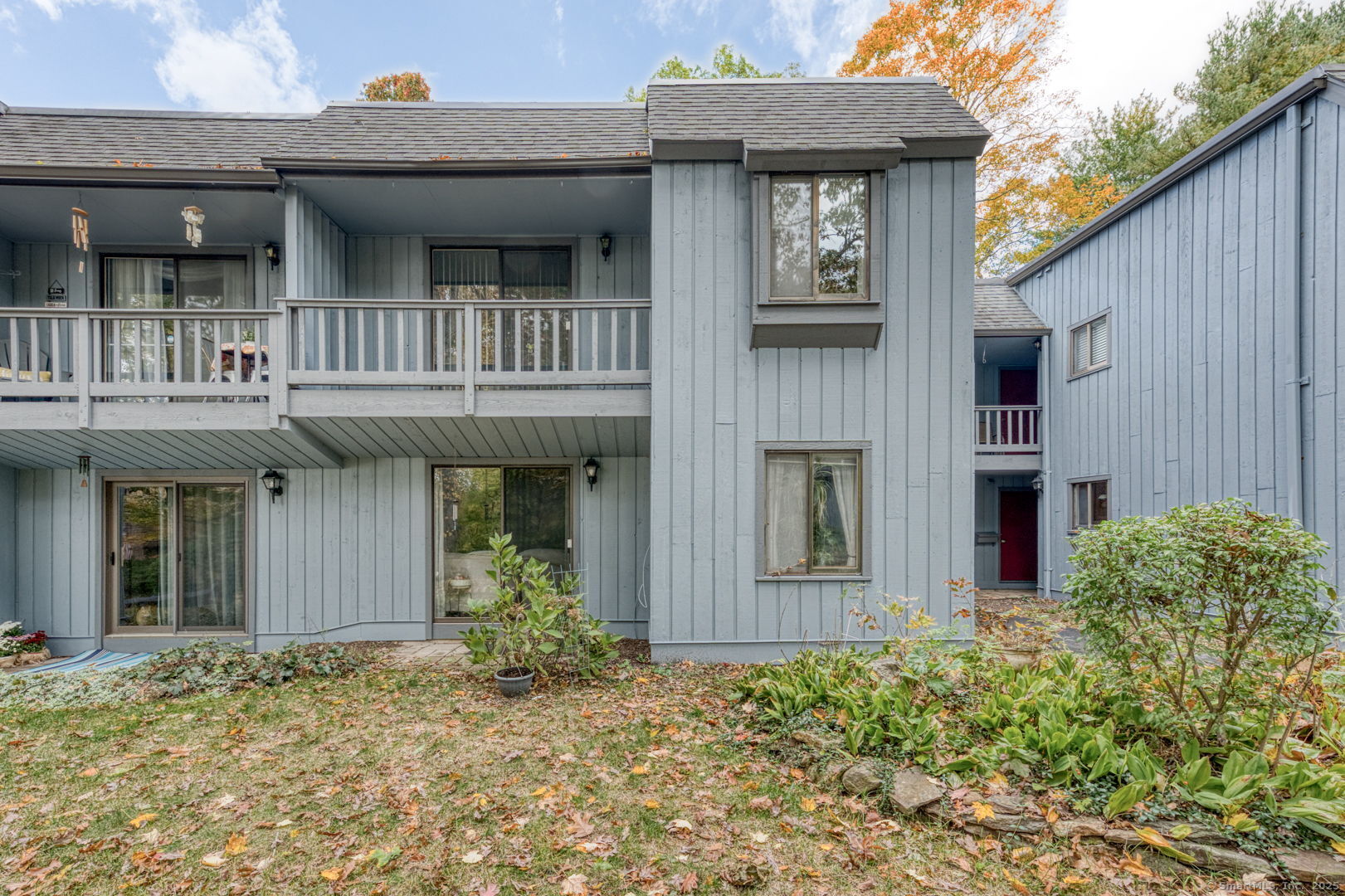 10 Deepwood Drive, Unit 10 Southington, CT 06489 - Photo 27 of 31 a front view of a house with garden