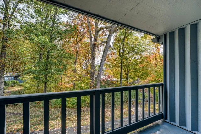a view of a city street from a balcony