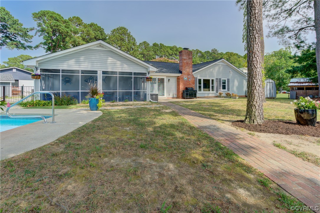 20 South Sioux Road Kilmarnock, VA 22482 - Photo 14 of 46 a front view of a house with a yard