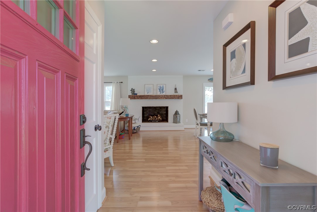 20 South Sioux Road Kilmarnock, VA 22482 - Photo 15 of 46 a living room with furniture and a fireplace
