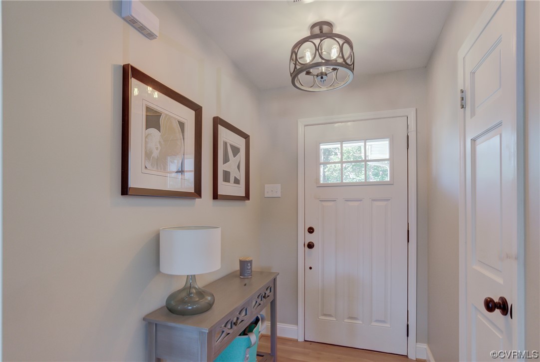 20 South Sioux Road Kilmarnock, VA 22482 - Photo 16 of 46 a view of entryway with wooden floor