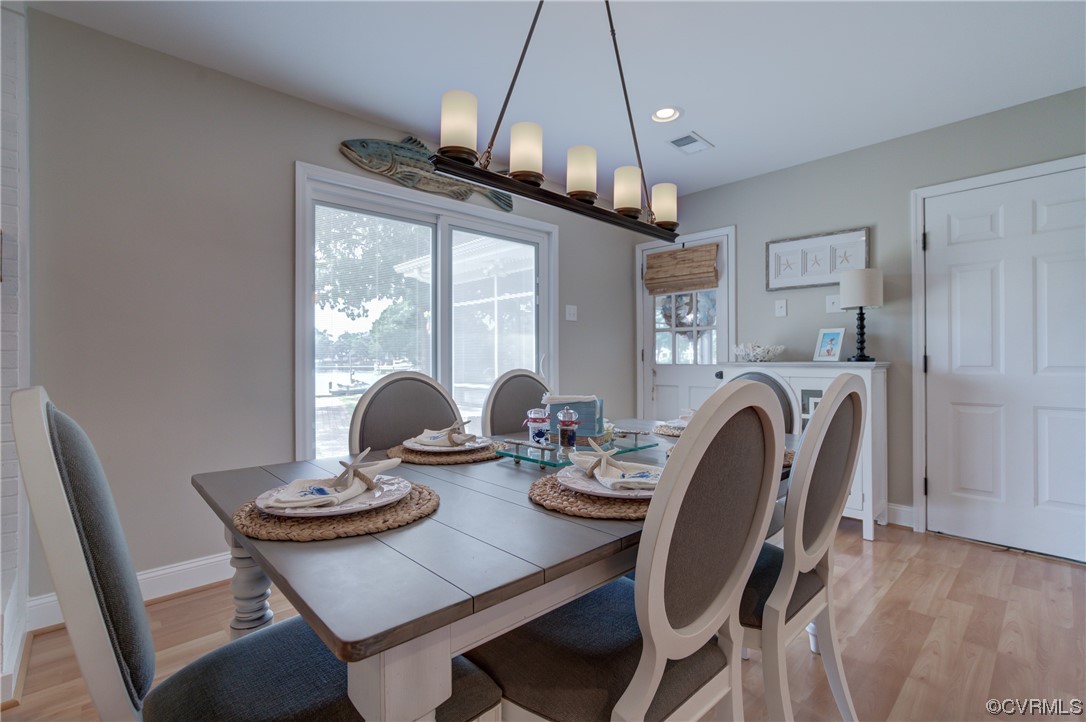20 South Sioux Road Kilmarnock, VA 22482 - Photo 20 of 46 a view of a dining room with furniture window and outside view