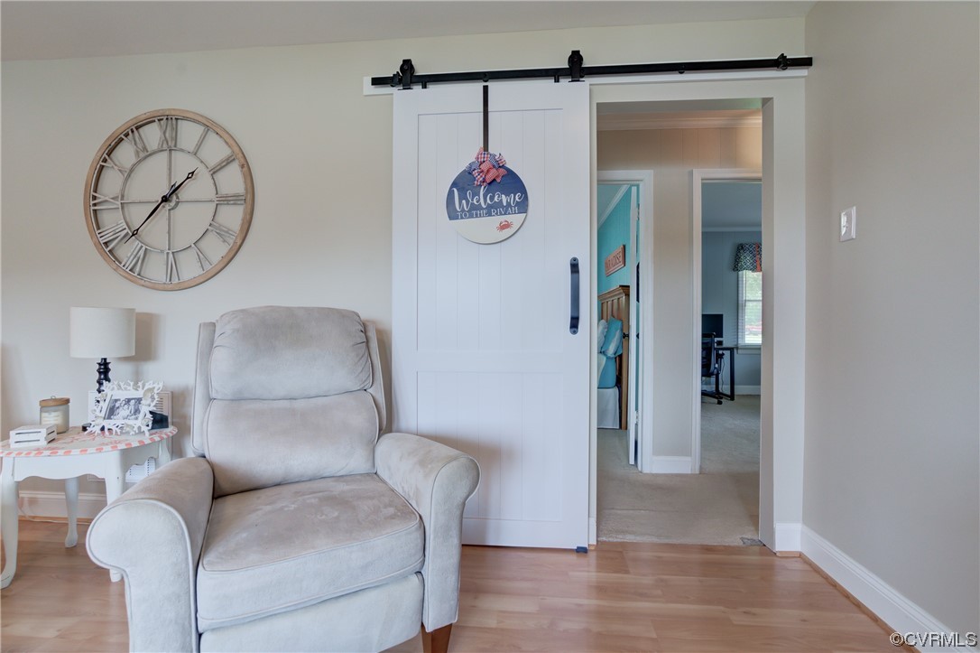 20 South Sioux Road Kilmarnock, VA 22482 - Photo 27 of 46 a living room with furniture and a table