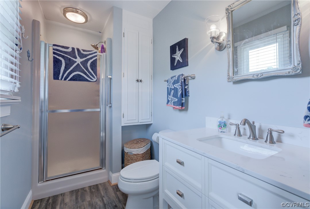 20 South Sioux Road Kilmarnock, VA 22482 - Photo 30 of 46 a bathroom with a sink toilet and shower