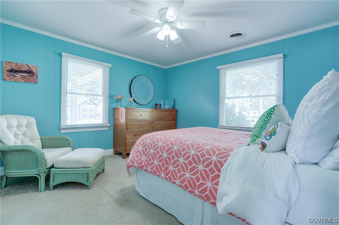 20 South Sioux Road Kilmarnock, VA 22482 - Photo 32 of 46 a bedroom with a bed and windows