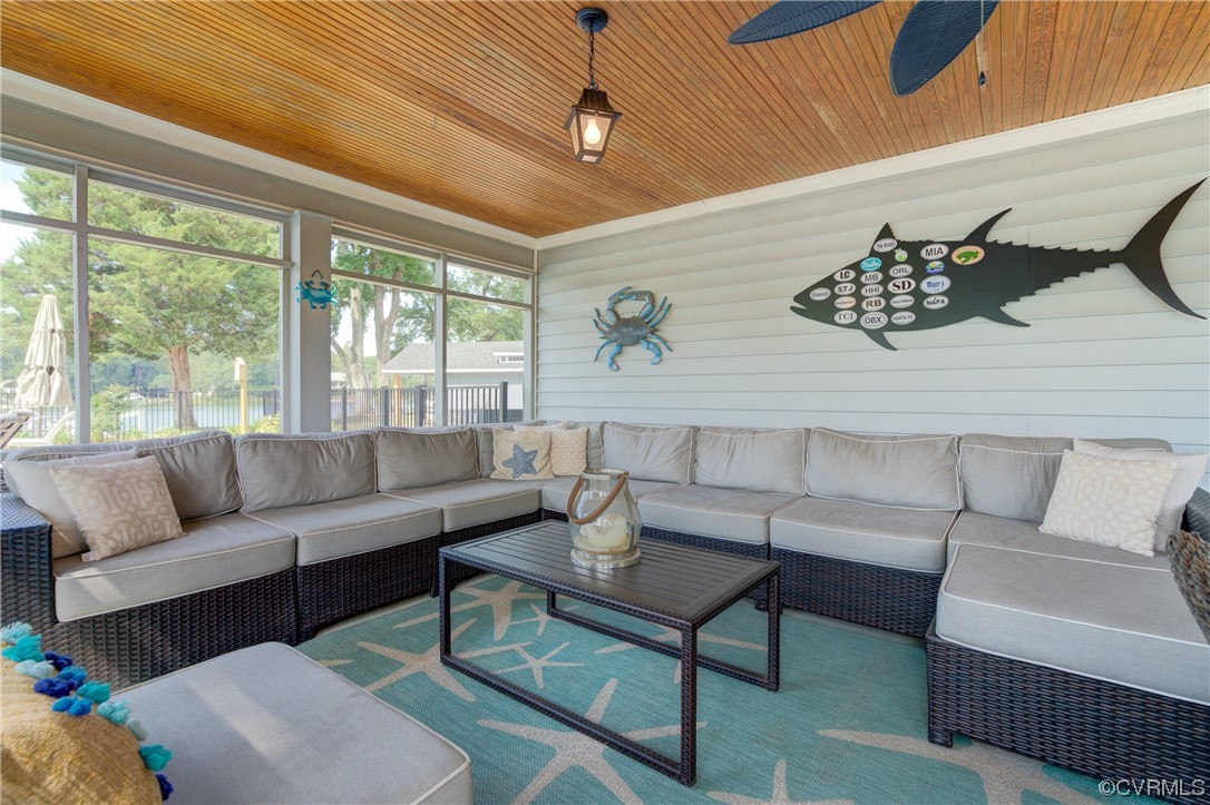 20 South Sioux Road Kilmarnock, VA 22482 - Photo 35 of 46 a living room with furniture and a large window