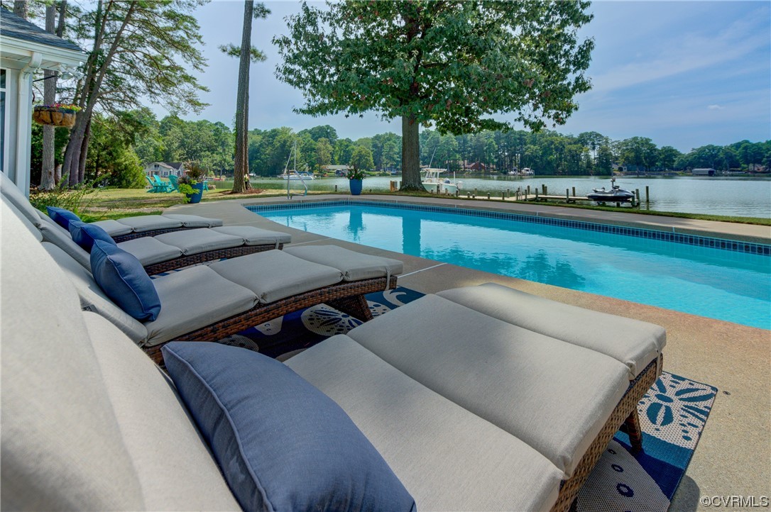 20 South Sioux Road Kilmarnock, VA 22482 - Photo 38 of 46 a view of a swimming pool with a patio and a yard