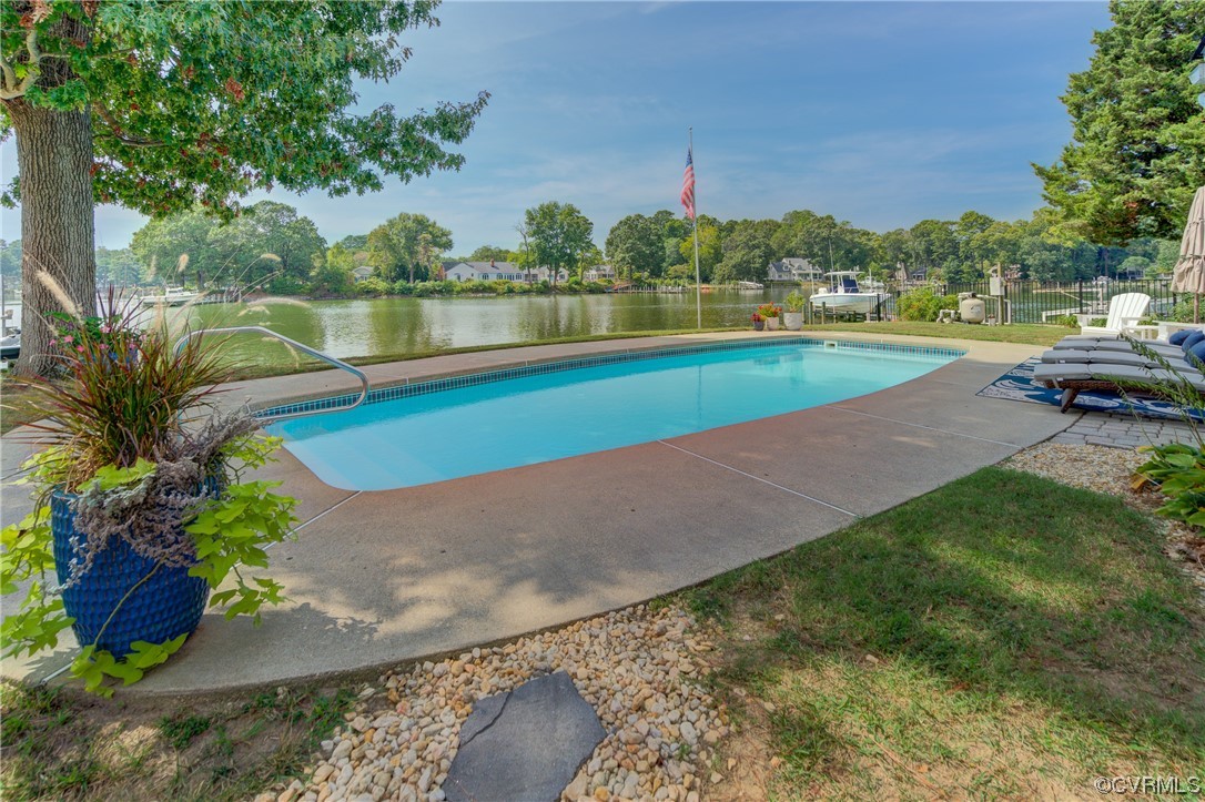 20 South Sioux Road Kilmarnock, VA 22482 - Photo 39 of 46 a view of a lake with a yard and a large tree
