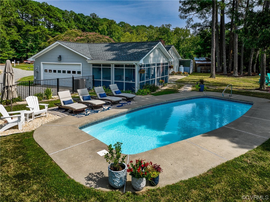 20 South Sioux Road Kilmarnock, VA 22482 - Photo 4 of 46 a view of a house with swimming pool and sitting area