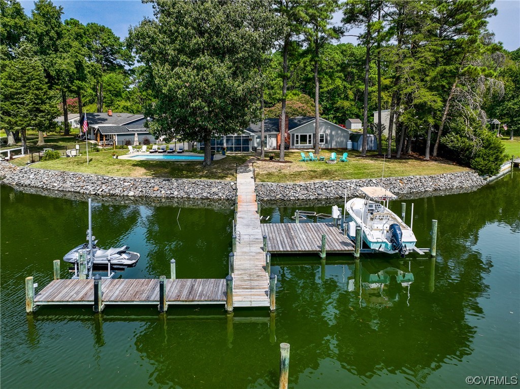 20 South Sioux Road Kilmarnock, VA 22482 - Photo 5 of 46 a view of a lake with a yard