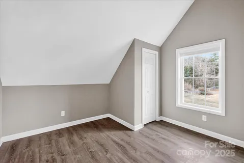a view of staircase with white walls and white walls