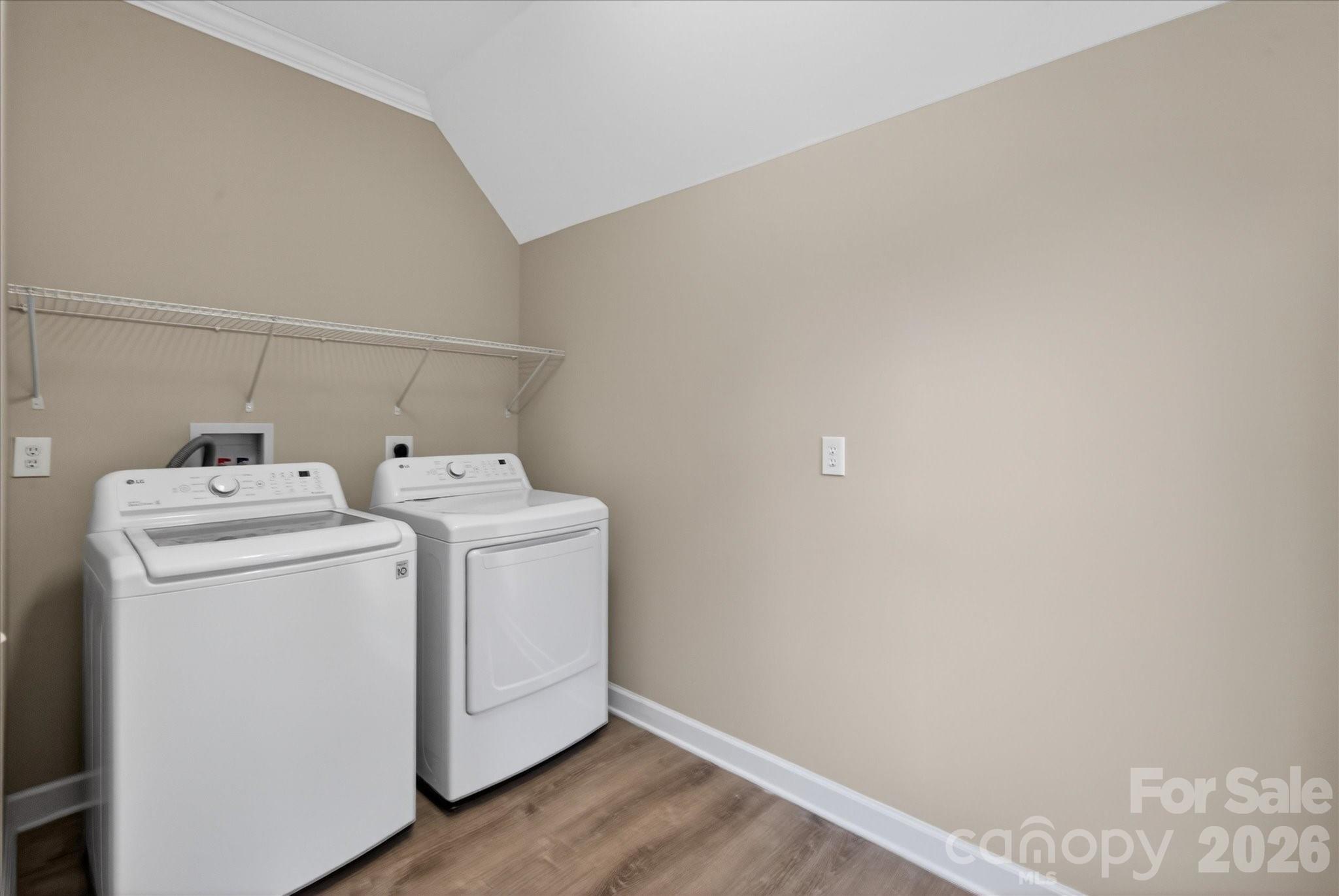 2221 Waxhaw-Marvin Road Waxhaw, NC 28173 - Photo 14 of 30 a utility room with dryer and washer