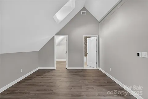 a view of a hallway with a glass door