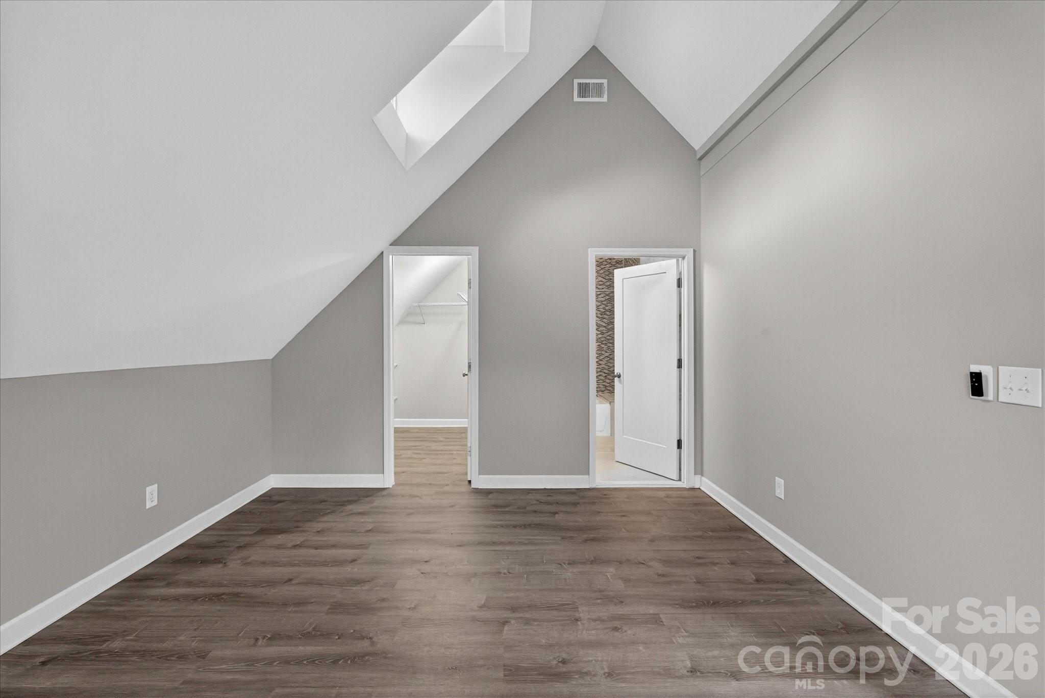2221 Waxhaw-Marvin Road Waxhaw, NC 28173 - Photo 19 of 30 a view of an empty room with wooden floor