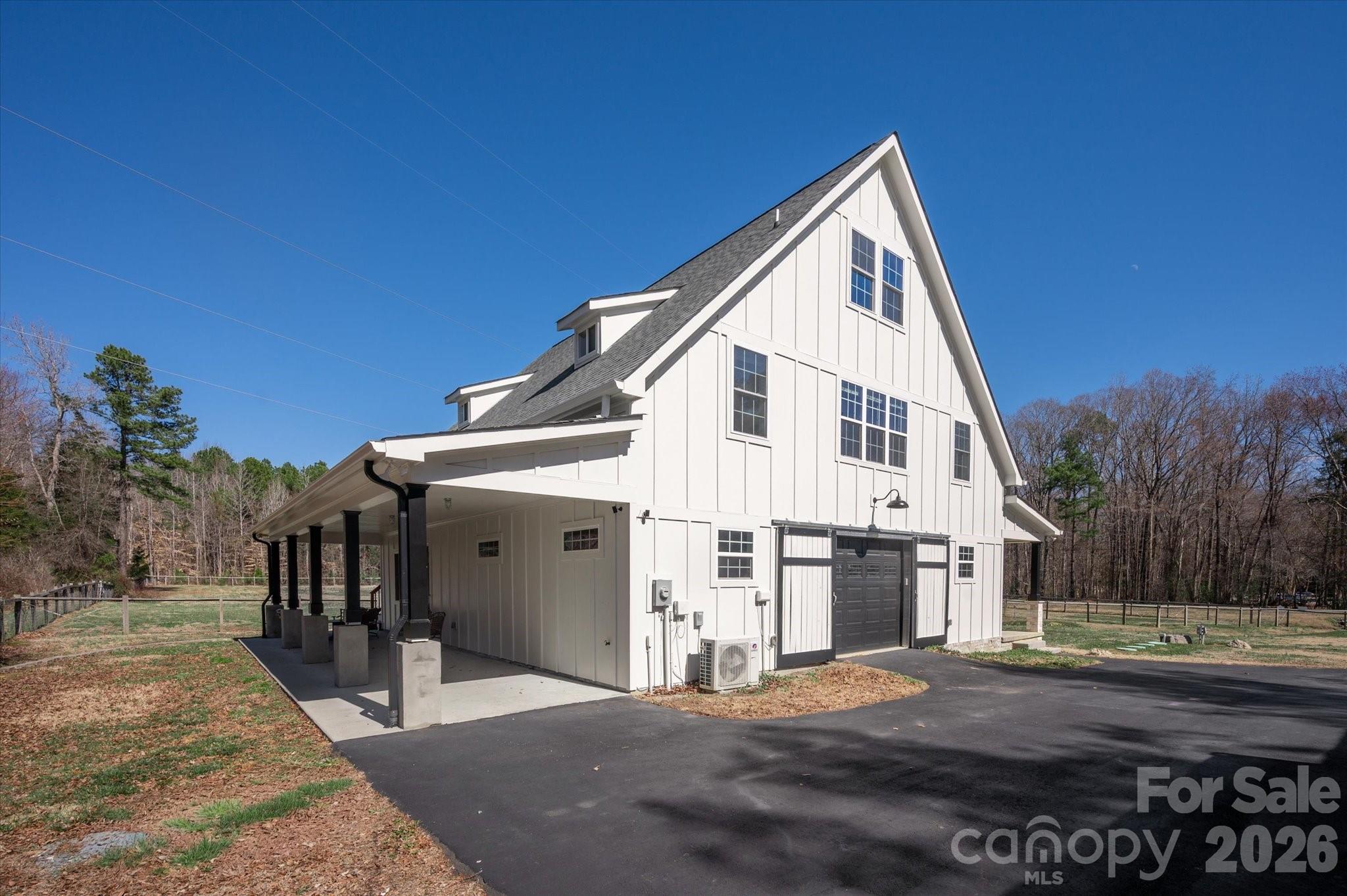 2221 Waxhaw-Marvin Road Waxhaw, NC 28173 - Photo 2 of 30 a view of a house with a yard