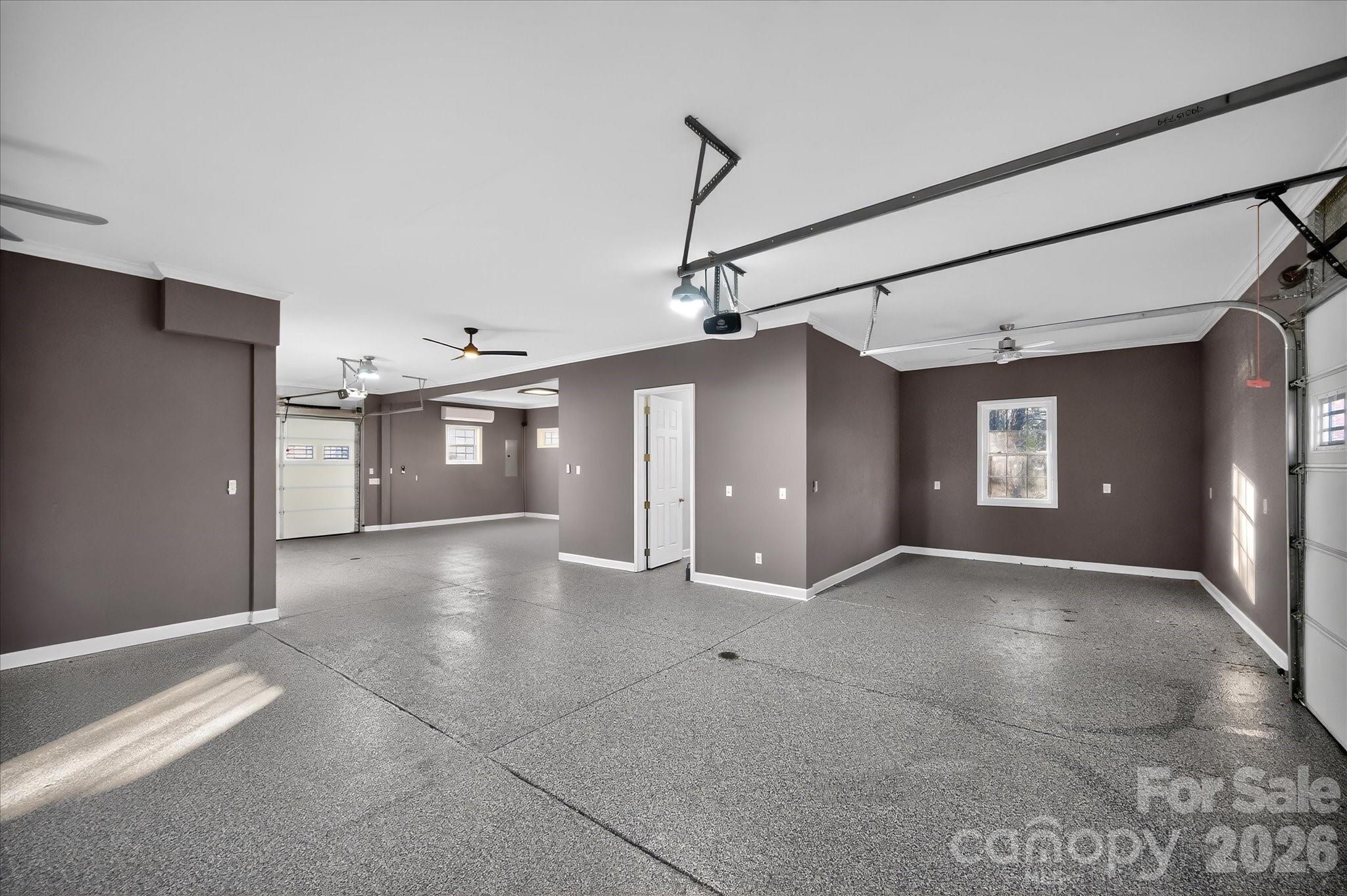 2221 Waxhaw-Marvin Road Waxhaw, NC 28173 - Photo 22 of 30 a view of a big room with closet and windows