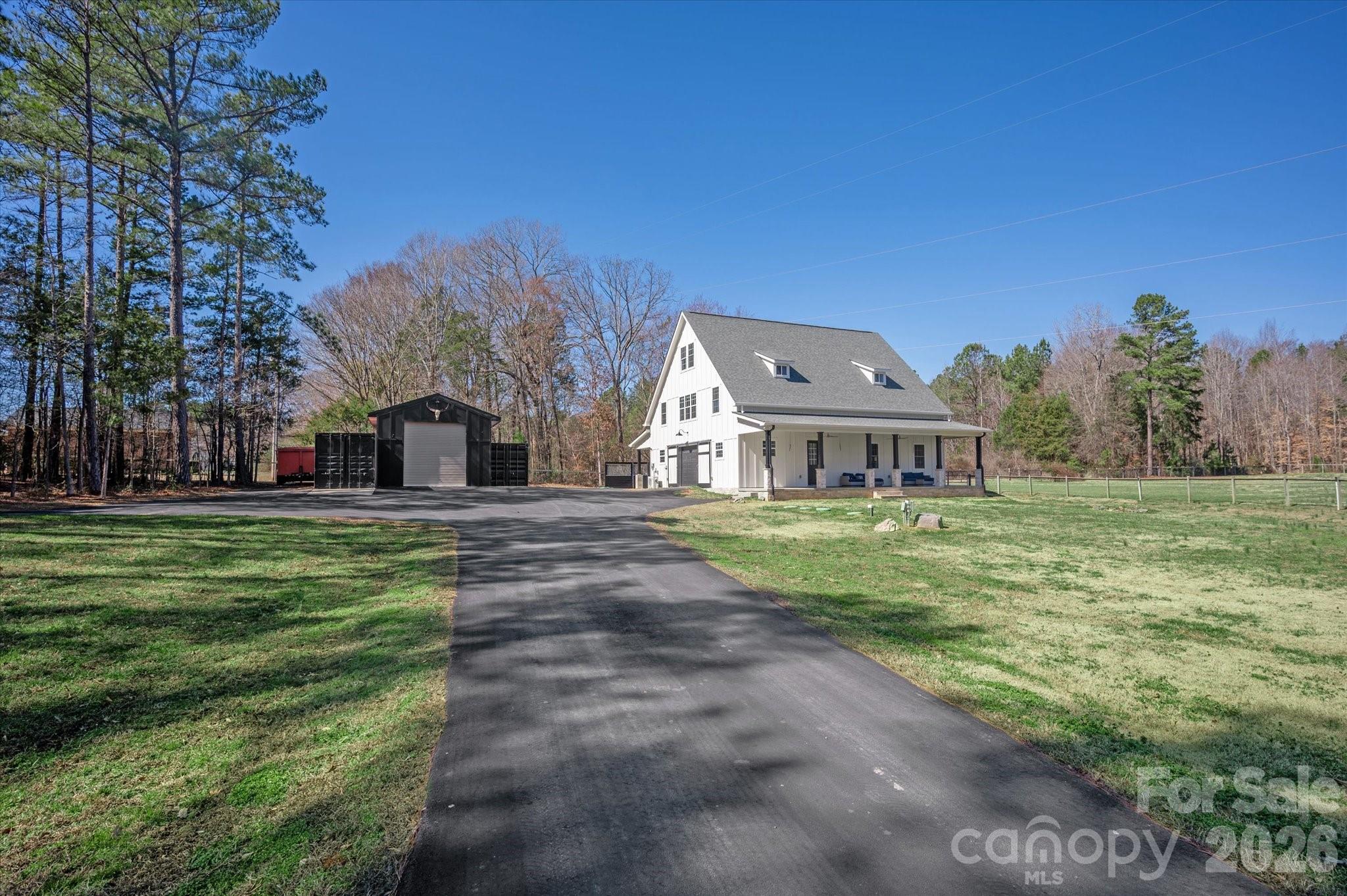 2221 Waxhaw-Marvin Road Waxhaw, NC 28173 - Photo 29 of 30 a view of a house with a big yard